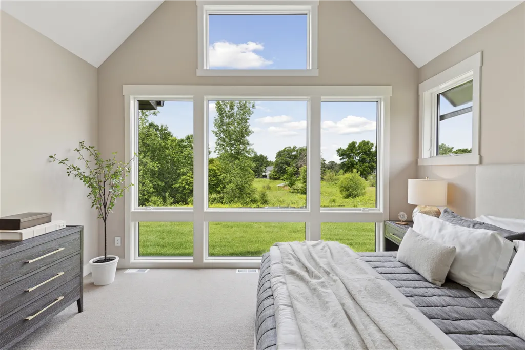 Contemporary minimalist bedroom with luxury design and modern furniture.