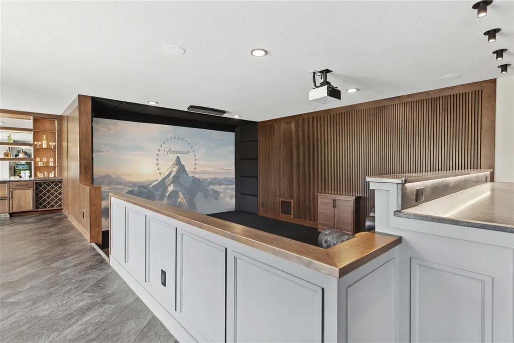Contemporary minimalist interior design in a luxury home with modern furniture and wooden cabinets.
