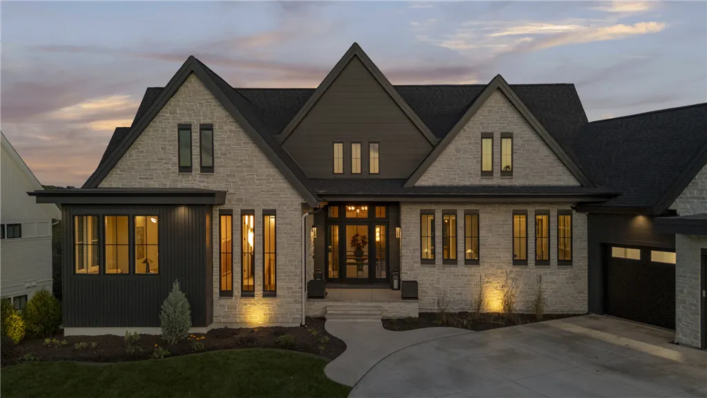 Charming suburban bungalow with lush greenery and classic architecture.