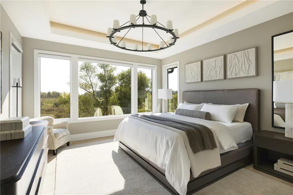 Contemporary minimalist bedroom with luxury design, featuring a bed, rug, chair, and sofa.