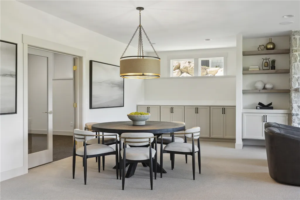 Contemporary basement living room with luxury decor and modern furniture.