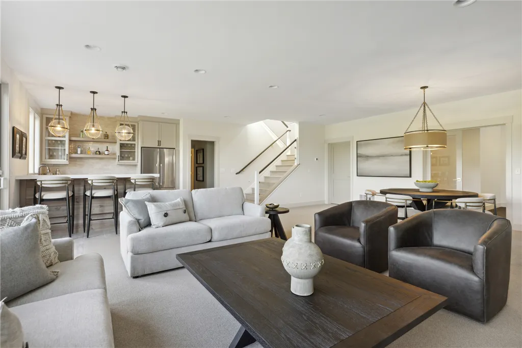 Contemporary family room with luxury furniture and minimalist design.