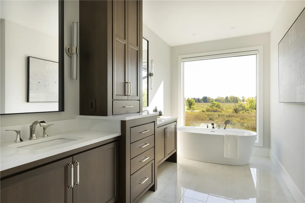 Contemporary luxury bathroom with bathtub and modern design.