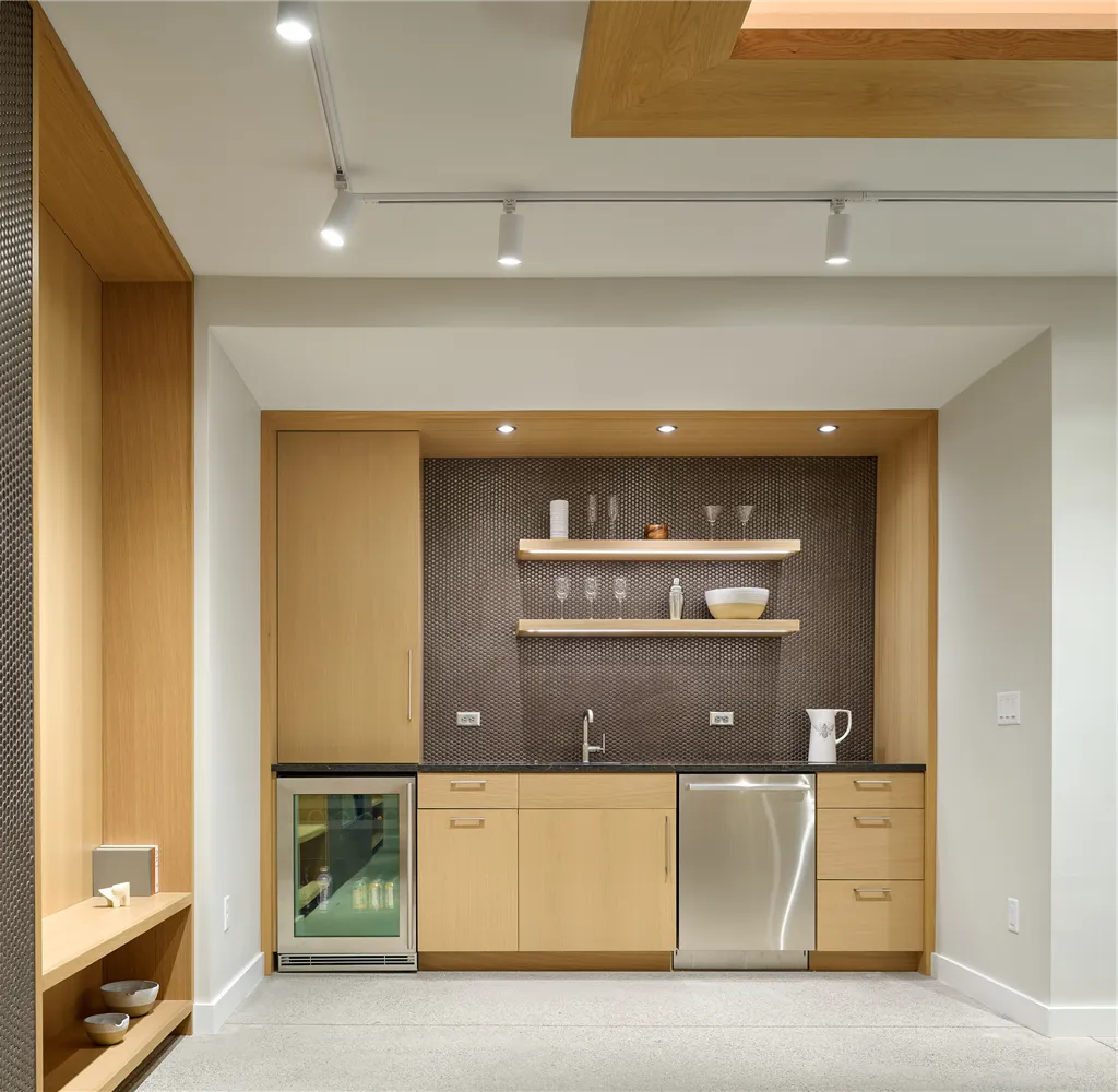 Contemporary luxury family room with minimalist furniture and spacious design.