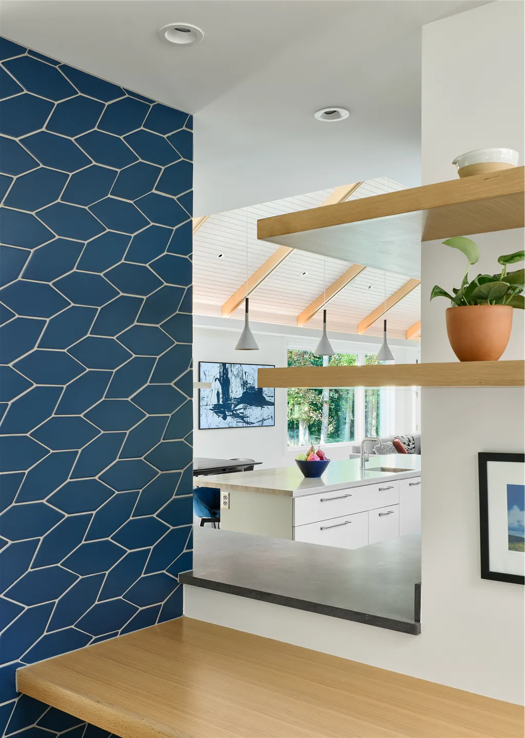 Contemporary minimalist butler pantry with wooden furniture and parquet flooring.