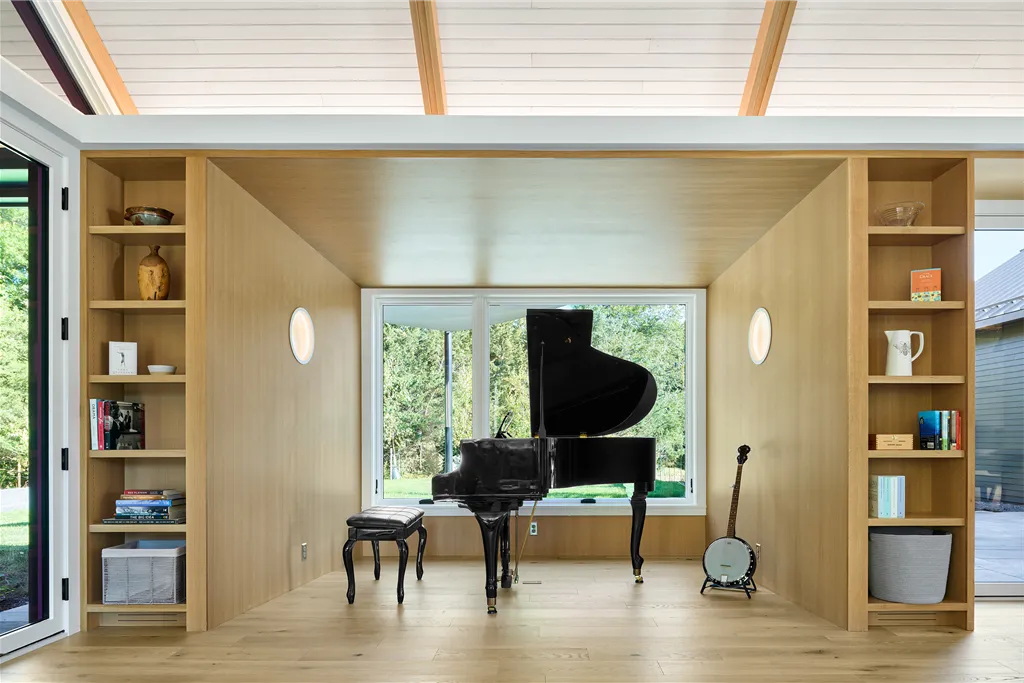 Contemporary music room with wooden interior and furniture.
