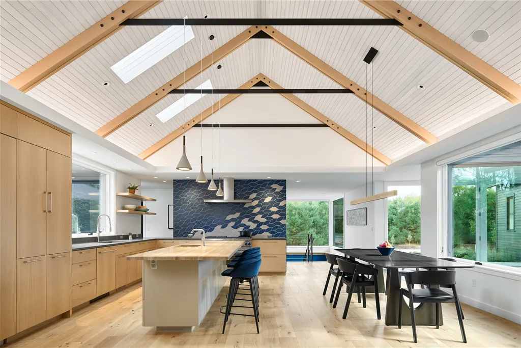 Contemporary luxury kitchen interior with wooden furniture and minimalist design.